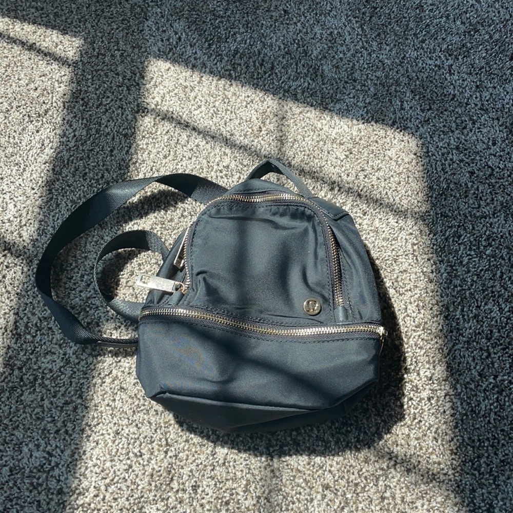 Black lululemon mini backpack purse